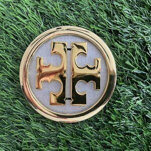 Tory Burch metal bag emblem